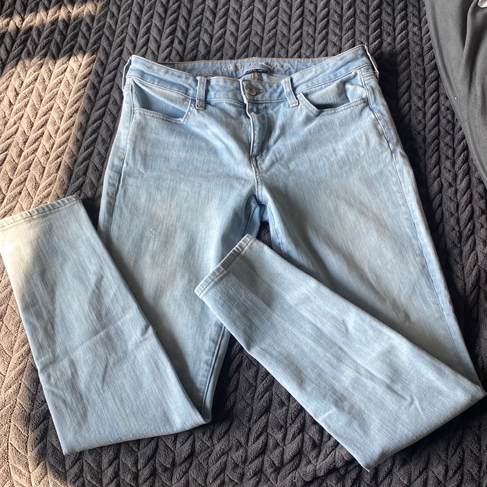 Light wash mid rise skinny jeans